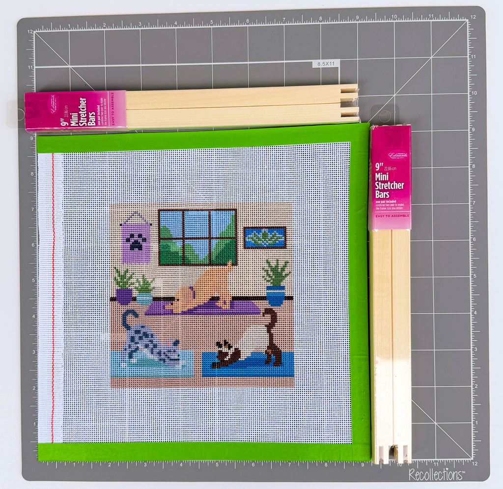 Yoga Downward Dog needlepoint canvas shown at 5x5 inch size with stretcher bars, printed on 18-count Zweigart mono canvas