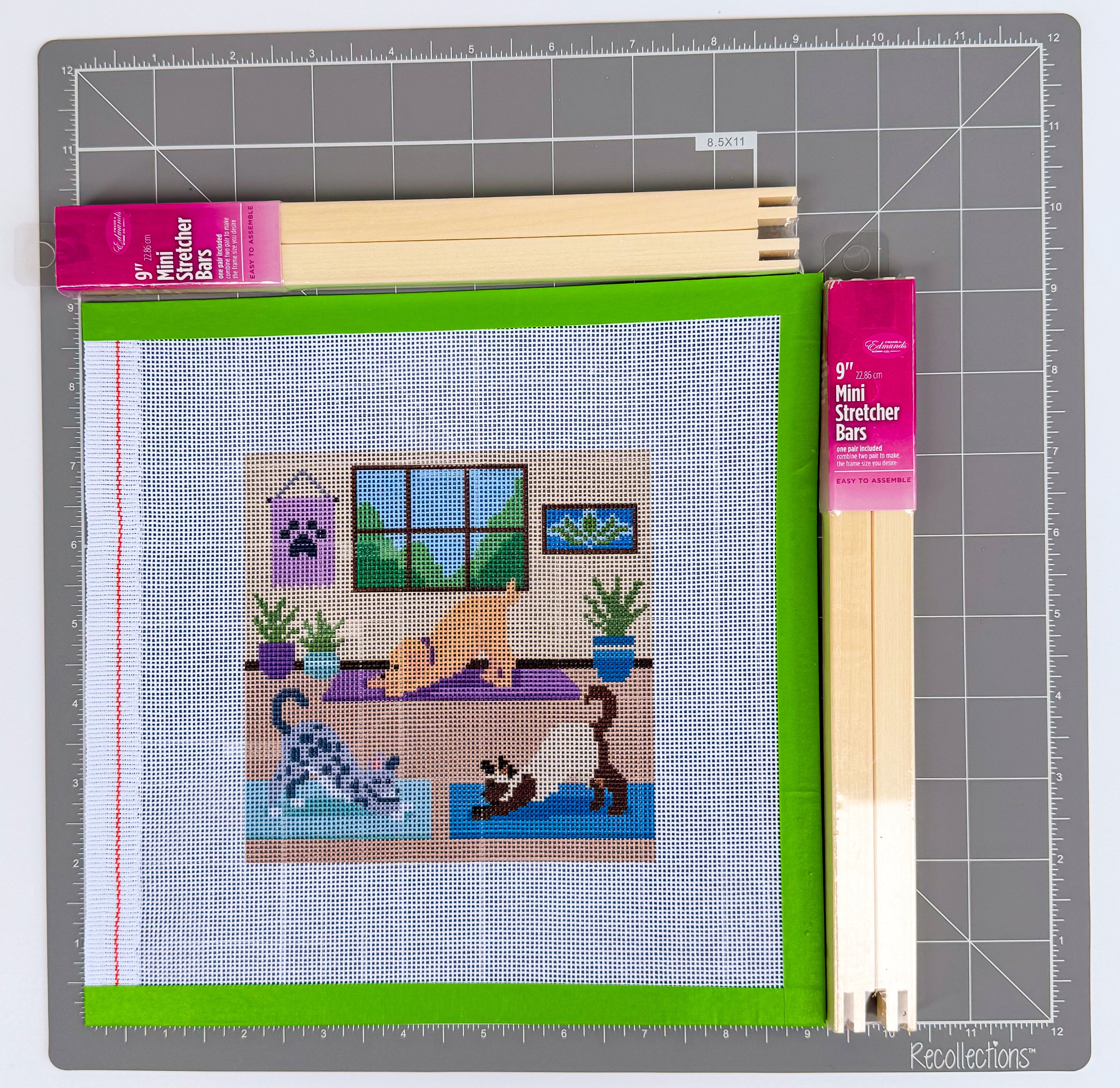 Yoga Downward Dog needlepoint canvas shown at 5x5 inch size with stretcher bars, printed on 18-count Zweigart mono canvas